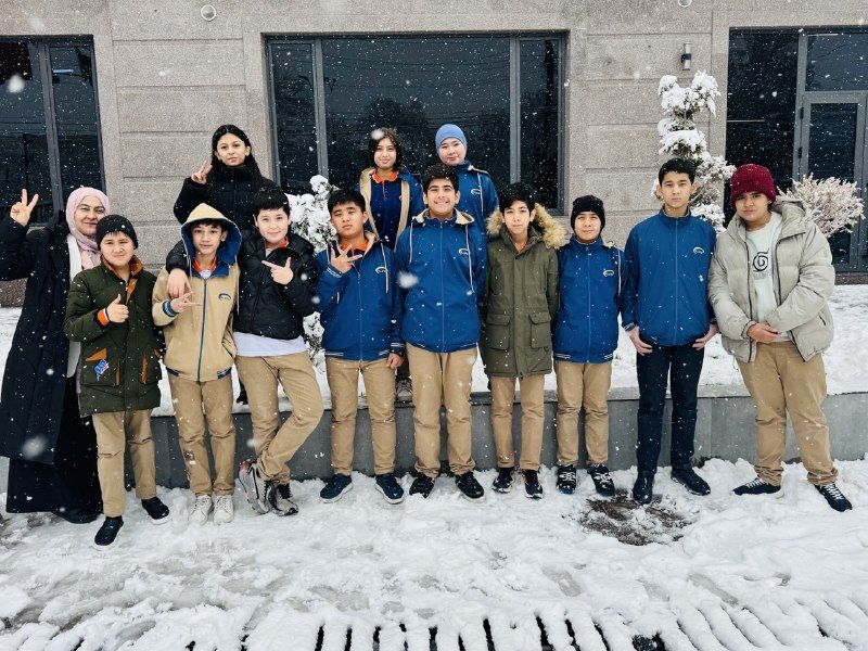 Ellipse students and teacher on a snowy day